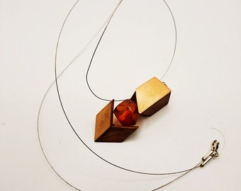 Apple wood and Baltic amber pendant necklace.