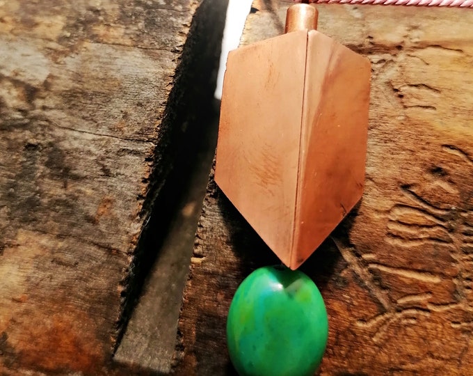 Locket with turquoise and copper