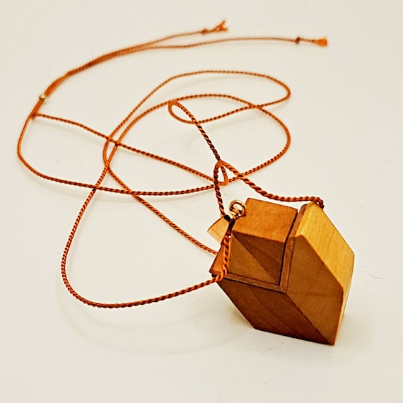 Geometric pendant; Wood and copper
