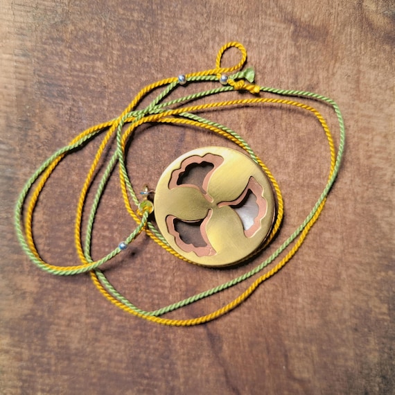 Circular pendant "Three ginko leaf"