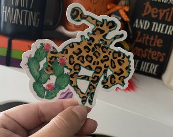 Leopard bucking horse sticker