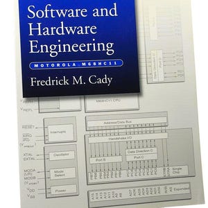 May include: A textbook titled Software and Hardware Engineering Motorola M68HC11 by Fredrick M. Cady. The cover features a blue rectangular section with white text and a light gray background displaying a detailed technical block diagram.