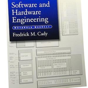 May include: A textbook titled "Software and Hardware Engineering" by Fredrick M. Cady. The cover is blue with white text and the Motorola M68HC11 logo. The book is open, revealing diagrams of electronic components.