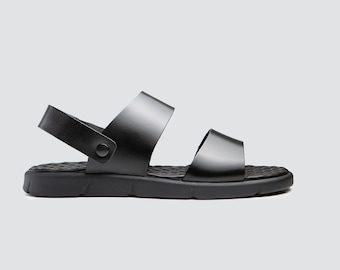 Handgjorda svarta minimalistiska sandaler i läder, bekväma sommarskor för vardagsbruk