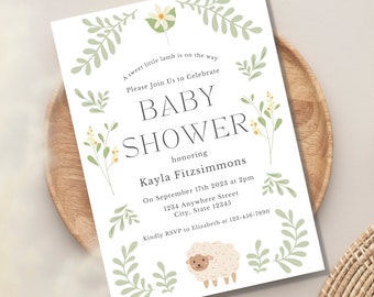 May include: A white baby shower invitation with green leaves and yellow flowers. The text reads "A sweet little lamb is on the way. Please join us to celebrate Baby Shower honoring Kayla Fitzsimmons. On September 17th 2023 at 2pm 1234 Anywhere Street City, State 12345. Kindly RSVP to Elizabeth at 123-456-7890". There is a white lamb with brown eyes and a pink nose at the bottom of the invitation.