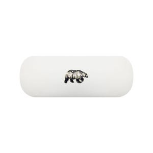May include: A white glasses case with a black and white bear silhouette design. The bear graphic features a mountain and forest scene. The case has a rounded rectangular shape.