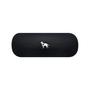 May include: A matte black, oblong-shaped hard case with rounded ends. Centred on the front surface is a small, white graphic illustration of a standing dog in profile, featuring a distinct heart-shaped cutout detail on the animal's torso.