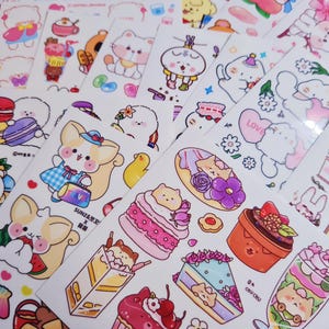 May include: A sheet of colorful stickers featuring cute cartoon animals, desserts, and other whimsical designs. The stickers are perfect for adding a touch of personality to journals, planners, laptops, and more.