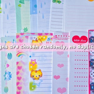 Puede incluir: Una colecci&oacute;n de hojas de papeler&iacute;a coloridas con varios dise&ntilde;os, incluyendo corazones, gatos y arco&iacute;ris. El texto "designs are chosen randomly, no duplicates" es visible. Las hojas tienen secciones rayadas y sin rayas.