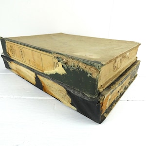 May include: Two vintage, worn, green and black hardback books with the title "Adelaide Letters" on the top book.