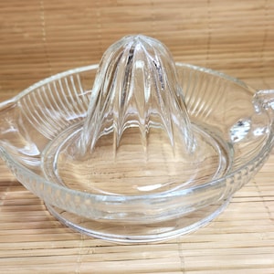 Vintage Glass Juicer: Ribbed Citrus Reamer with Thumb Handle