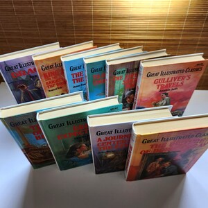 May include: A selection of vintage "Great Illustrated Classics" books. The books feature colourful covers with illustrations and titles such as "Gulliver's Travels" and "The Three Musketeers". The spines are white with the series title.