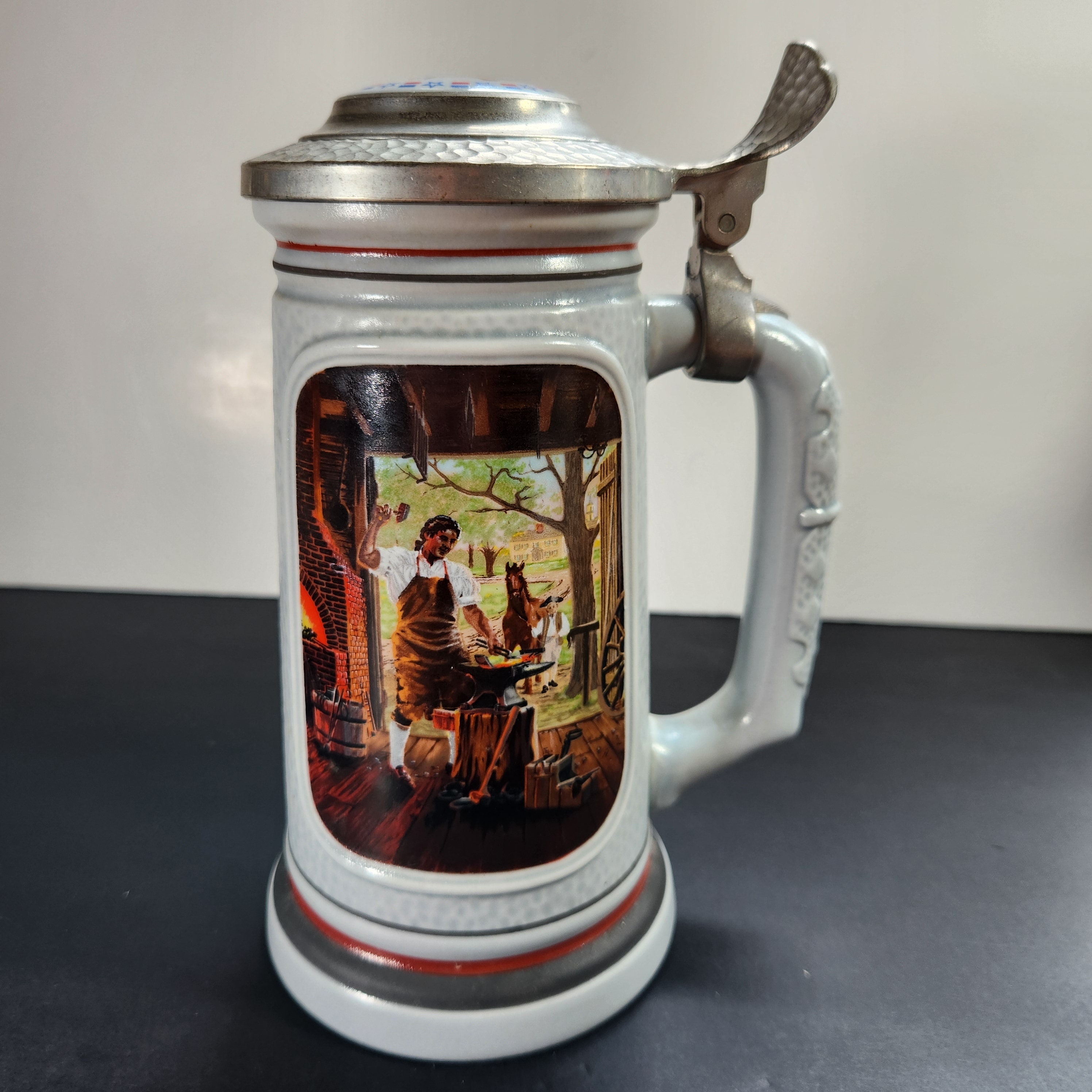 Beer Stein The Blacksmith Vintage 1986 Decorative Stoneware Pewter Lid 1 Liter Capacity Handmade Brazil for Avon Canada Village Blacksmith