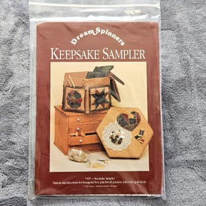 May include: A rustic wooden sign with the text "Welcome to our home" in white lettering. The sign features a distressed finish and a simple, inviting design, perfect for a front porch or entryway.