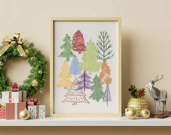 May include: A framed print of a colorful abstract illustration of a forest with multiple trees. The print is on a white shelf with a gold wreath, wrapped gifts, and a gold deer figurine.