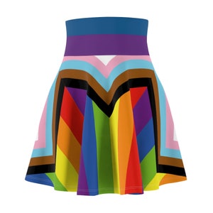 Può includere: Una gonna colorata con motivo arcobaleno e bandiera del pride transgender, con vita alta e silhouette svasata.