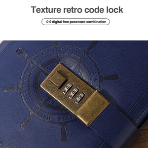 May include: A blue leather-bound journal with a brass combination lock and a nautical compass design. The lock has a 3-digit combination and the compass design features the words "Sailboat Travel Enjoy Your Time".
