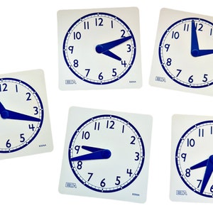 May include: Five white square cards with blue and white analog clocks showing different times. Each card has the text "BISAA" in the bottom left corner.