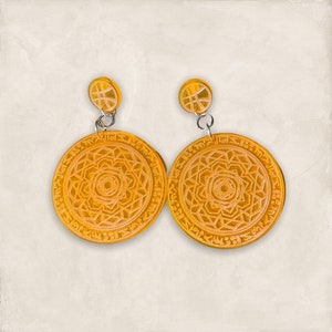 Boucles d’oreilles acryliques Dr Cast Spell