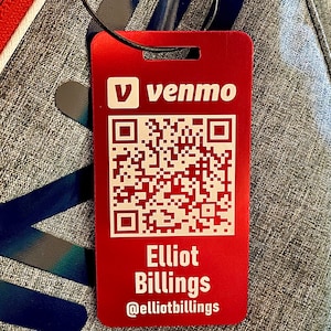 May include: A red rectangular tag with a white Venmo logo, a QR code, and the text "Elliot Billings @elliotbillings".