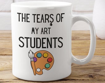 May include: White ceramic mug with black text that reads "The Tears of My Art Students" with a paintbrush and palette illustration.