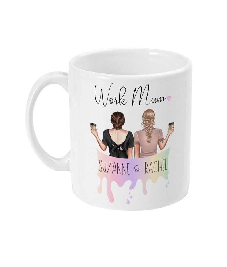 May include: White ceramic mug with a black and pink design. The mug features two women holding coffee cups with the text "Work Mum" and "Suzanne & Rachel" on the mug.