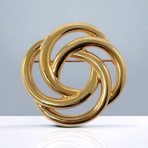 Vintage Monet Gold Tone Knot Brooch