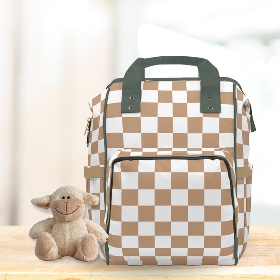 louis vuitton backpack checkered mini Denim Damier Monogram Patchwork Palm Springs Blue Rouge 1753868 FASHIONPHILE the different values of denim blue both raw and washed create a surprising illusion of texture LV Mini Palm Springs Damier