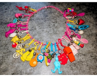 Vintage 1980s Retro Bell Clip On Charm Necklace Plastic Pink Chain 30 Charms EUC