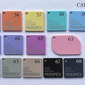 May include: A color chart of Perspex acrylic sheets. The chart shows 10 different colors, including pink, blue, yellow, green, and black. Each color is labeled with a number and a description. The chart is labeled "CATEGORY: F".