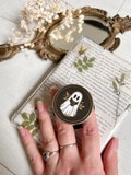 Reading ghost magnetic grip holder product logo