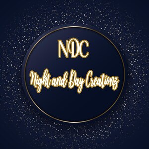 May include: A circular logo featuring a dark blue background with a gold border and gold text. The letters NDC appear at the top, while the words Night and Day Creationz are written in a cursive script below, surrounded by white glittery specks.