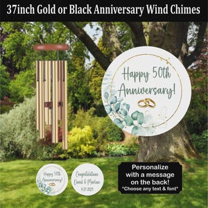 May include: A 37-inch gold wind chime with a brown top, hanging in a garden setting. The chime has multiple tubes and is accompanied by a sign that says "Happy 50th Anniversary!" and "Personalize with a message on the back!"