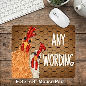 May include: A brown and white mouse pad with a chicken wire pattern. Two cartoon chickens are peeking out from behind the wire. The text "ANY WORDING" is printed on the mouse pad. The mouse pad measures 9.3 inches by 7.8 inches.