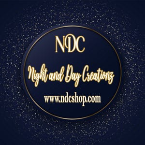 May include: A navy blue logo with gold text and a gold border. The logo reads "NDC Night and Day Creations" and includes the website address www.ndcshop.com. The background is a dark blue with gold speckles.