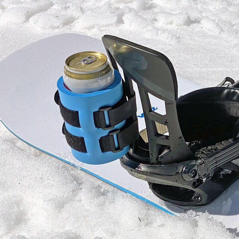Beer Binding Pro Strapped to Snowboard Binding on Snow