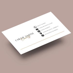 May include: White business card with black text and icons. The text reads "Chloe Smith Beauty" and includes contact information such as a phone number, email address, website, business address, and social media handle.