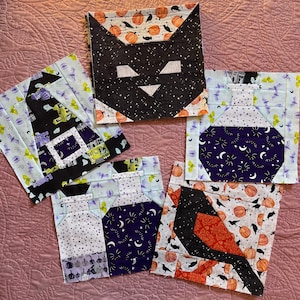 Könnte beinhalten: Neun Stoffquadrate mit Halloween-Motiv. Die Quadrate zeigen eine schwarze Katze, einen Hexenhut, eine Zaubertrankflasche, einen Kürbis und eine Fledermaus. Die Quadrate sind alle in verschiedenen Farben und Mustern gehalten.