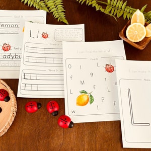 May include: A set of printable worksheets for learning the letter L. The worksheets feature a ladybug, a lemon, and the letter L in various activities, including tracing, writing, and finding the letter.