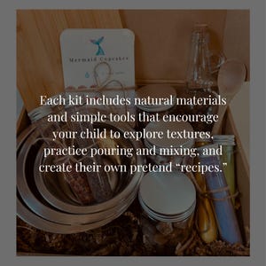 May include: A sensory play kit in a cardboard box containing stainless steel bowls, a wooden spoon, a glass bottle, clear plastic test tubes with colored contents, and small jars with silver lids. A card labeled Mermaid Cupcakes is included.