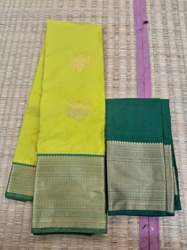 AFL3053 partywear saree in bottle green.comes with stitched blouse size 40,can be altered to 44 size.Fall peco done.