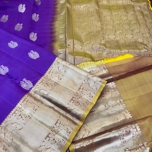 kss313 pure kanjivaram silk saree in purple w/ wide zari border. fall peco done. stitched blouse size: 38 to 46. silk mark certified