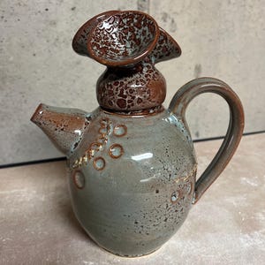 Handcrafted pottery teapot - Pushing It