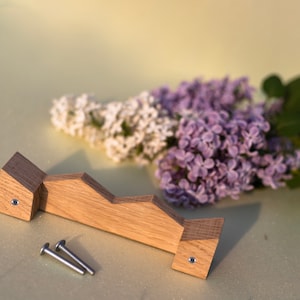 wood сurvy handle, scalloped squiggly grip, wavy wrist with threaded bushings and screws for cabinet door, kitchen desk drawer pull.
