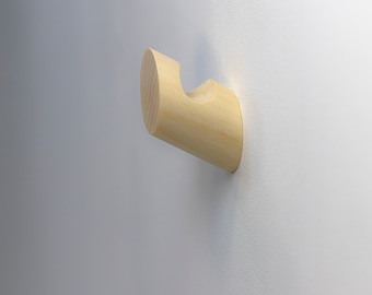 Krok för tavelupphängning. Liten träkrok för vägg. Minimalistisk krok för att hänga modern konst. Modern hängande väggförvaring inklusive skruvfästen.