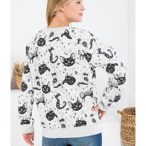 loose fit cat print sweater