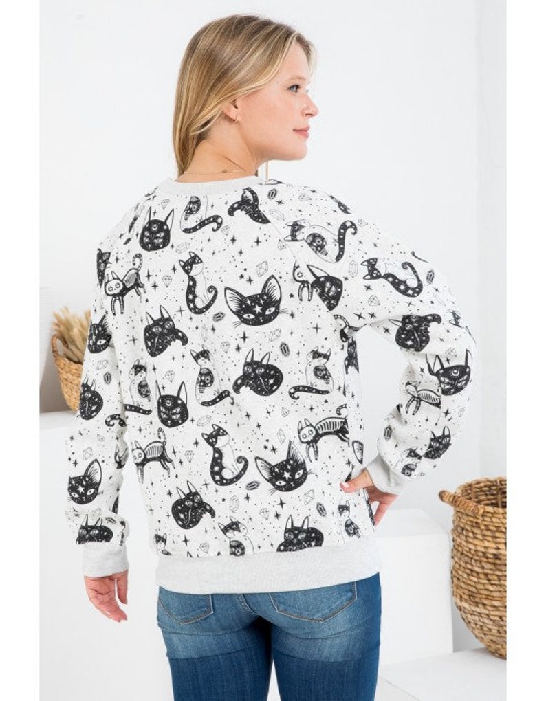 loose fit cat print sweater