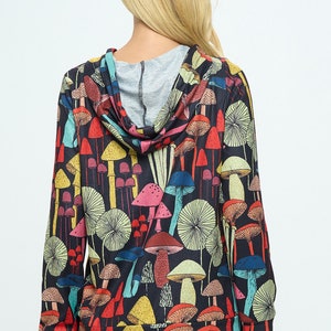 black hoodie with colorful mushroom print all over