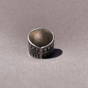 98.5% sterling silver ring with unique tribal engraved design