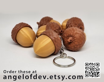Juguete antiestrés con clicker de bellota